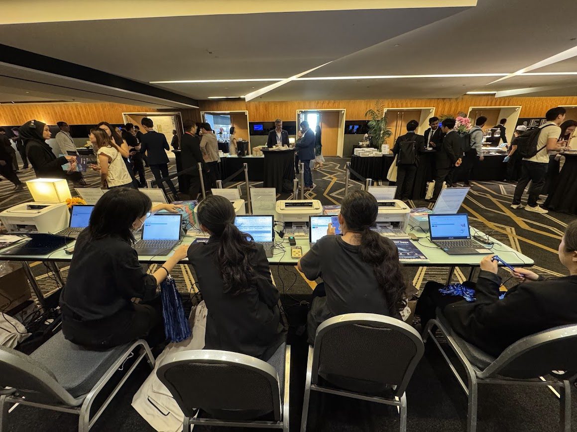 Event crew supporting live registration and attendance taking at a corporate event